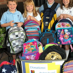 Just some of the backpacks donated to CASA from our Fall Service project.