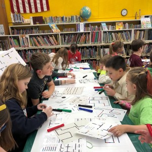 A STEM after school workshop had students working with Ozobot robots.